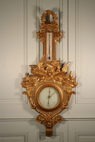 Baromètre de l’Amour, bois sculpté et doré, époque Louis XVI.