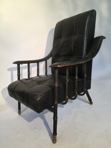 Fauteuil en cuir de Jacques ADNET.