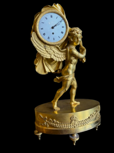 Pendulette au portefaix Restauration